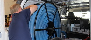  Water-Damage-Restoration-Technician-Prepping-Suction-Hoses
