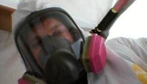 Water Damage Virginia Key Technician With Gas Mask