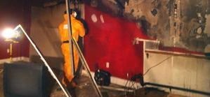 Water Damage Restoration and Wall Removal in Basement